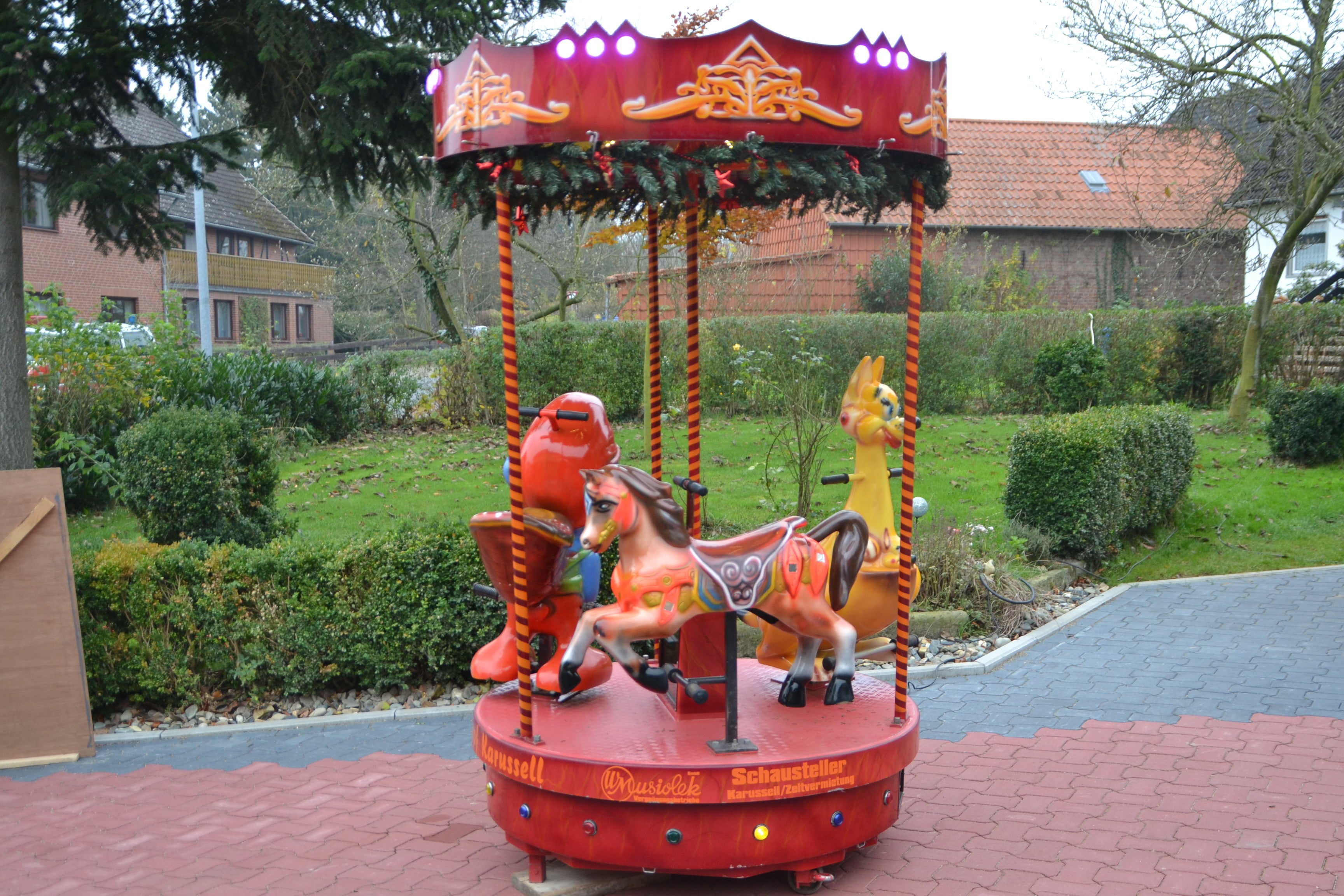 Schlumpfkarussell mieten – Kinderkarussell mit 3 Sitzplätzen