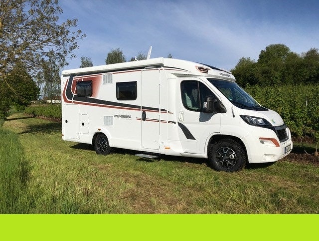 Luxusteilintegrierter Weinsberg 600 MEG mit Einzelbetten  TV, Navigation und Rückfahrkamera
