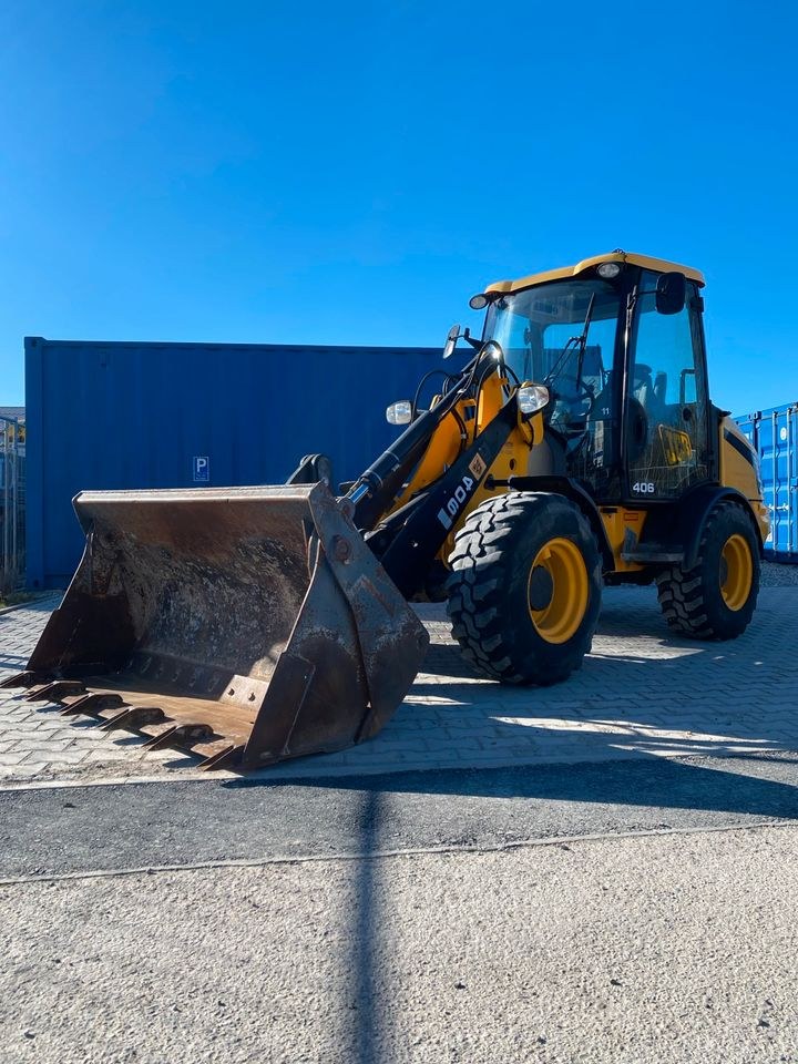 Radlader 4700 kg JCB 406 mit Palettengabel mieten bei menzinger