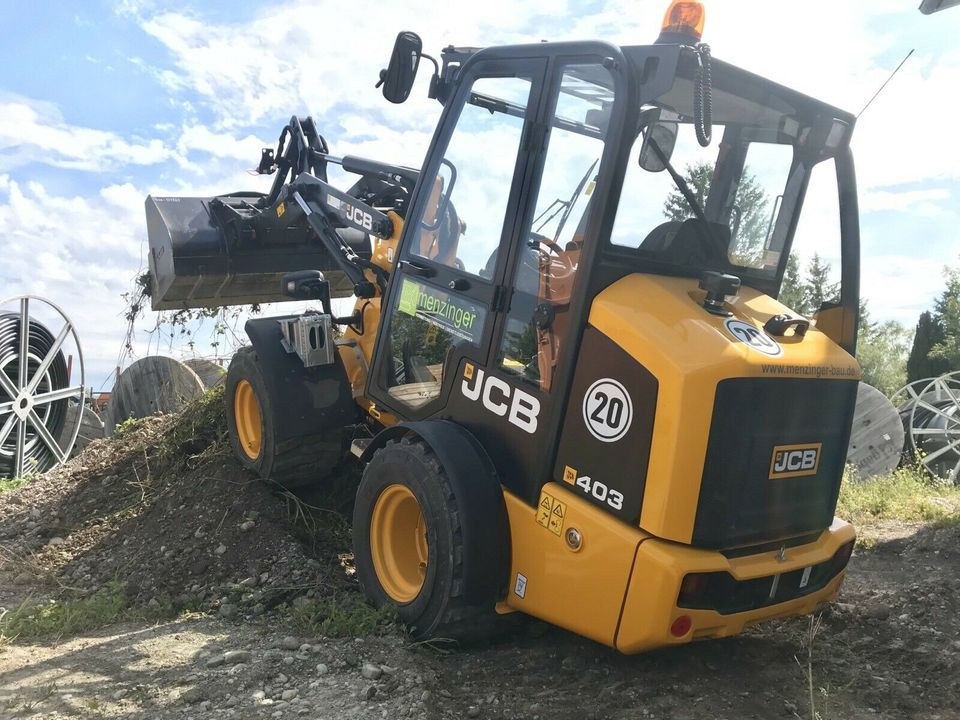 Radlader 2500 kg kompakt JCB 403 mit Schaufel mieten bei menzinger – 4