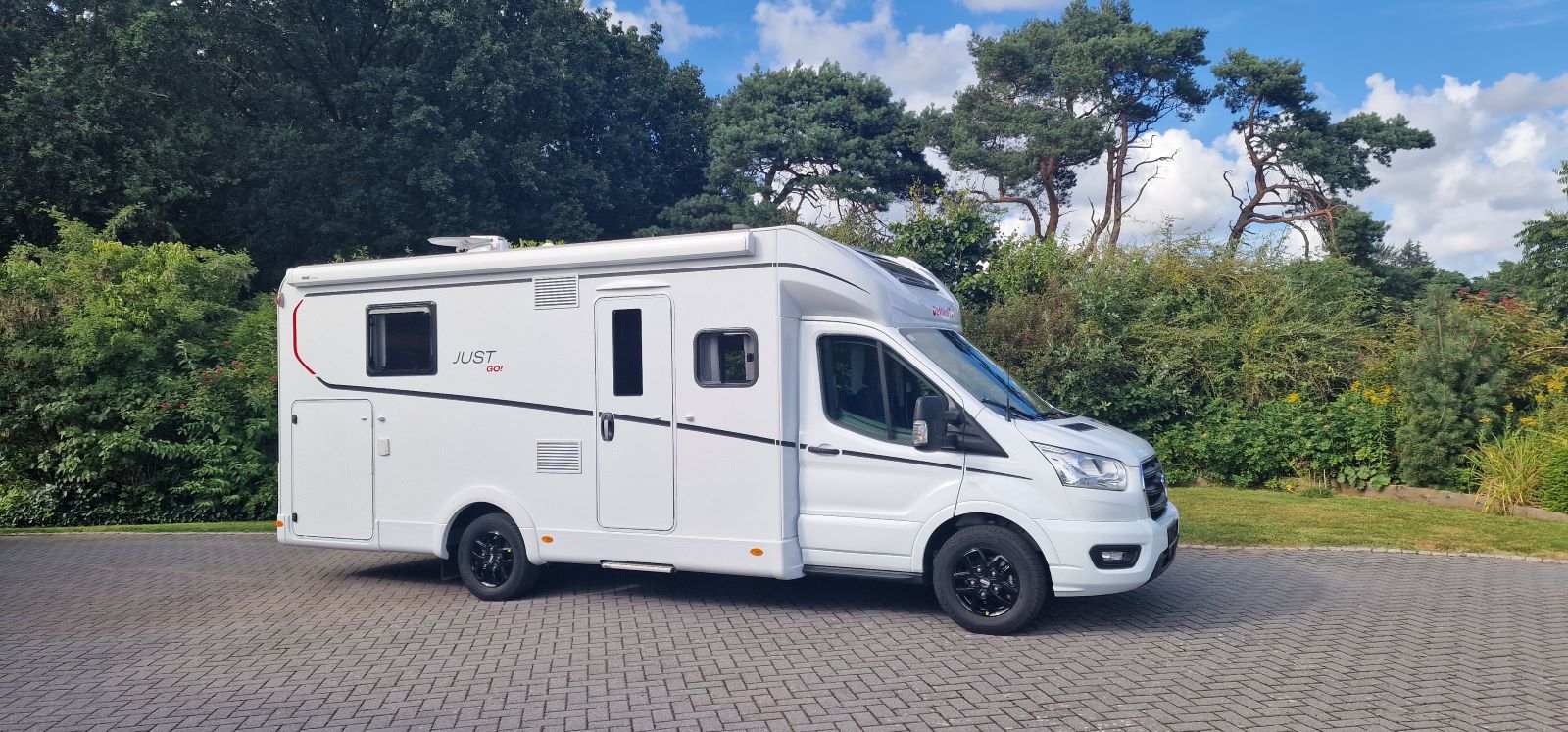Wohnmobil mieten – Dethleffs Just Go T 7055 DBL Automatik mit Queensbett, TV, Navi (Wurster Nordseeküste)