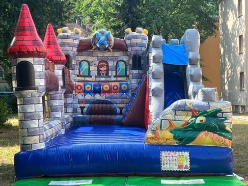 Hüpfburg mieten Drachen-Ritterburg mit Rutsche – Profi Springburg 6x4x5 m inkl. Zubehör
