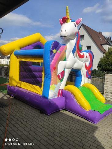 Hüpfburg mieten Einhorn mit Rutsche – Profi Springburg 4x4x4 m inkl. Zubehör – 2