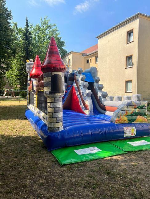 Hüpfburg mieten Drachen-Ritterburg mit Rutsche – Profi Springburg 6x4x5 m inkl. Zubehör – 3