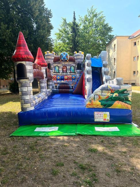 Hüpfburg mieten Drachen-Ritterburg mit Rutsche – Profi Springburg 6x4x5 m inkl. Zubehör – 2