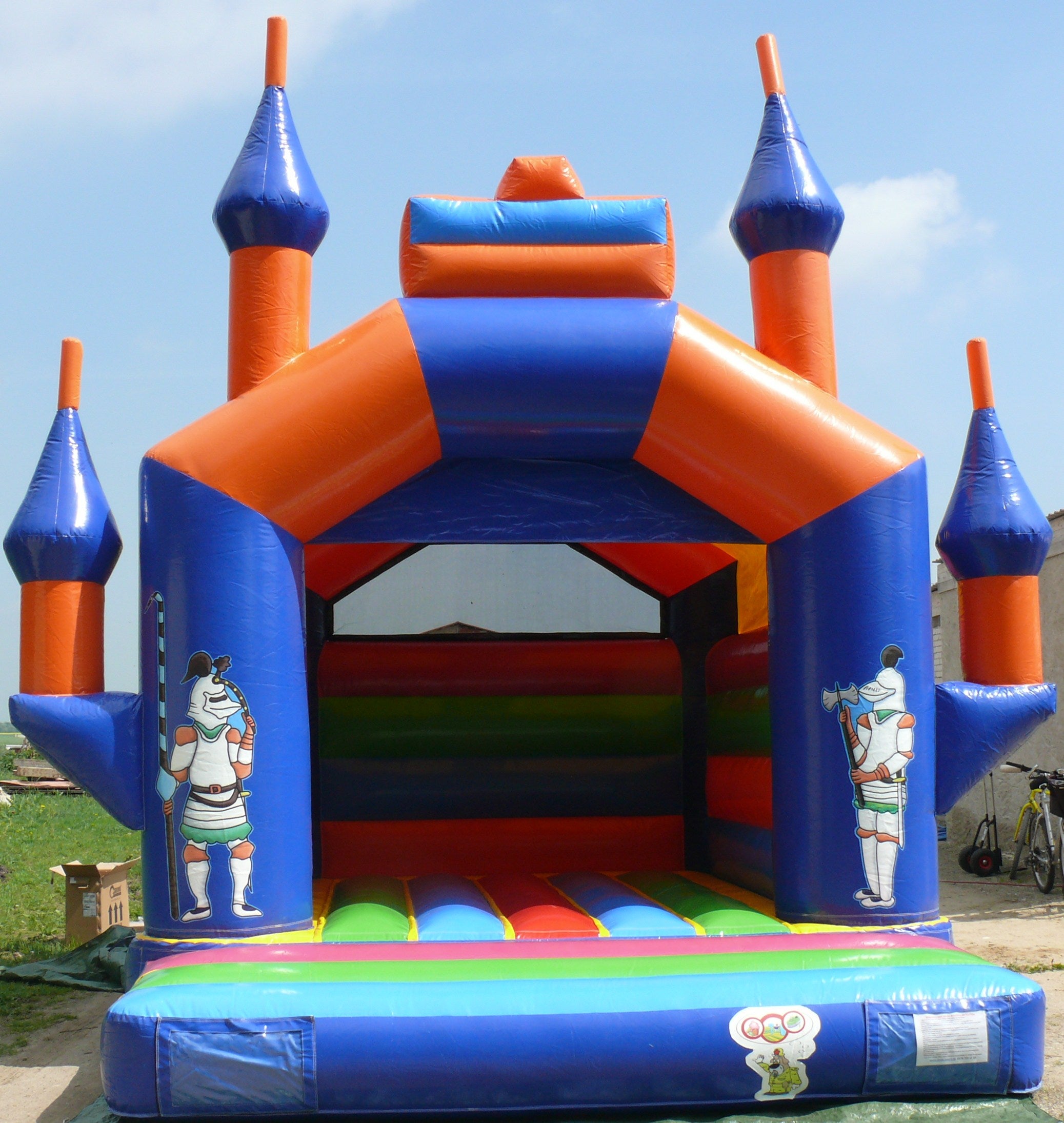 Hüpfburg Ritterburg mieten – farbig, 5x4x5 m, Spaß für kleine & große Kinder