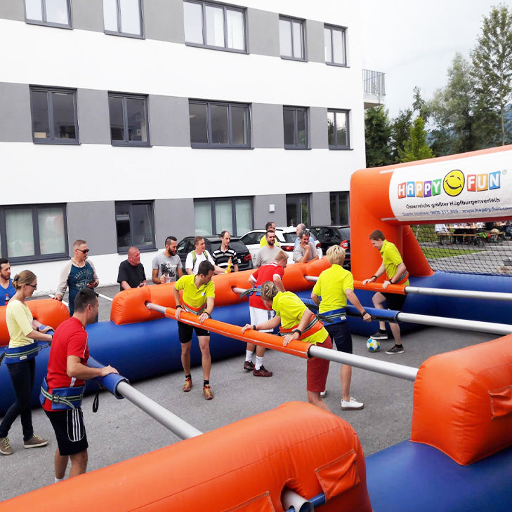 Riesenwuzzler mieten 10 Spieler blau/orange 13,5×7 m – Teamevent