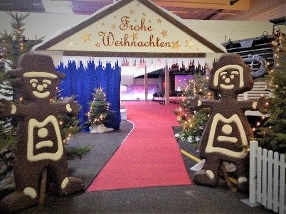 Weihnachtsmarkt-Eingang mieten – Deko-Tor „Frohe Weihnachten“ ca. 300 cm