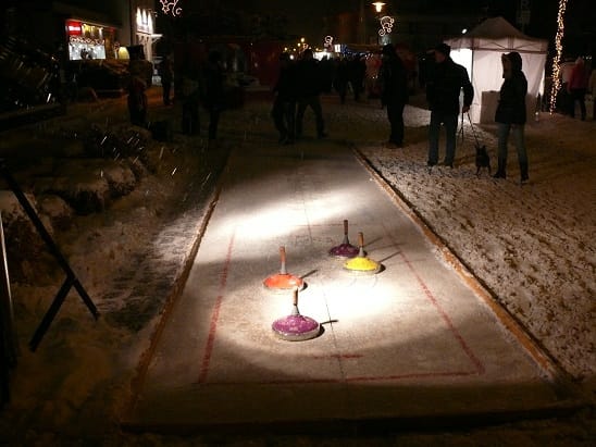 Eisstock schießen - Curling , Winter Spiele , Eisstockbahn